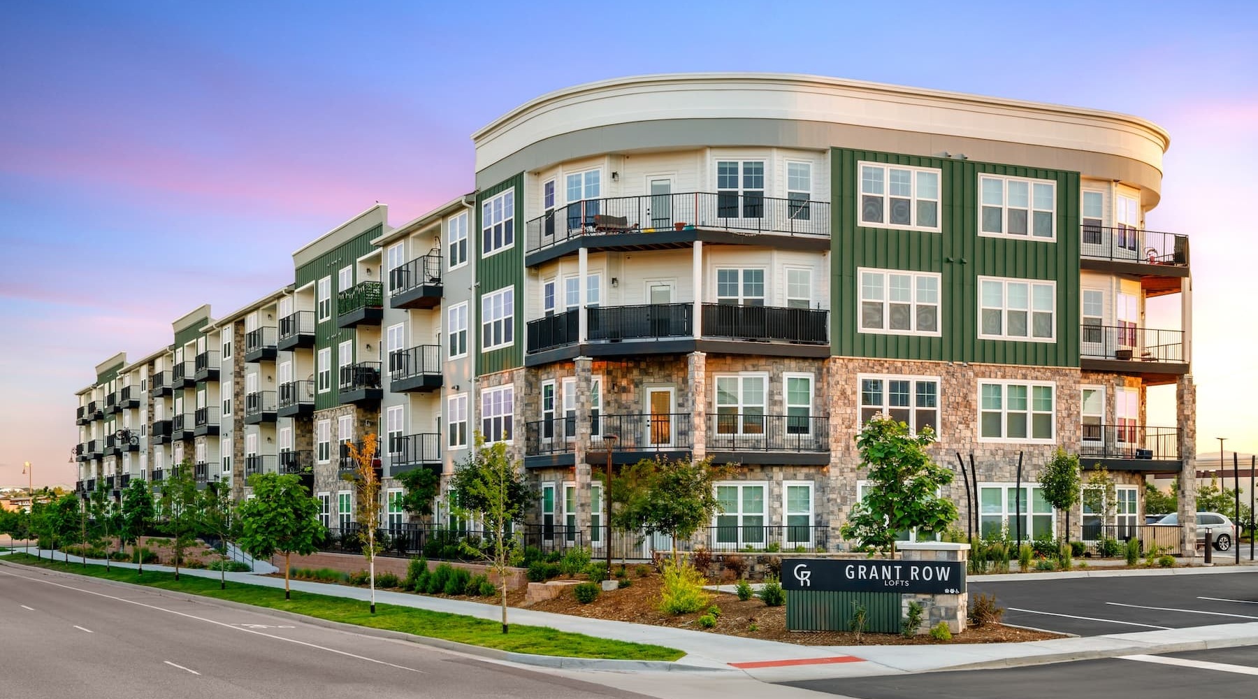 Experience the difference exterior of building with nearby landscaping